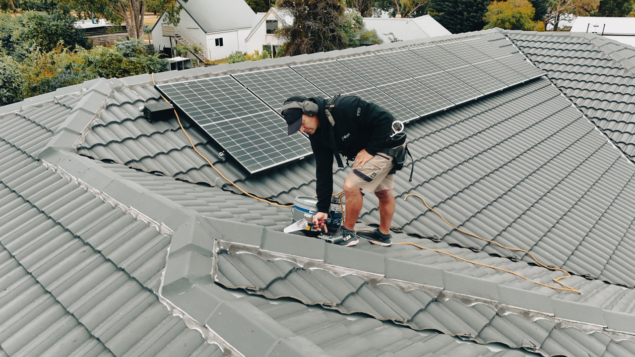 Riviera Roofing Javier Rodriguez Javier Rodriguez repairing and restoring on a roof in East Gippsland