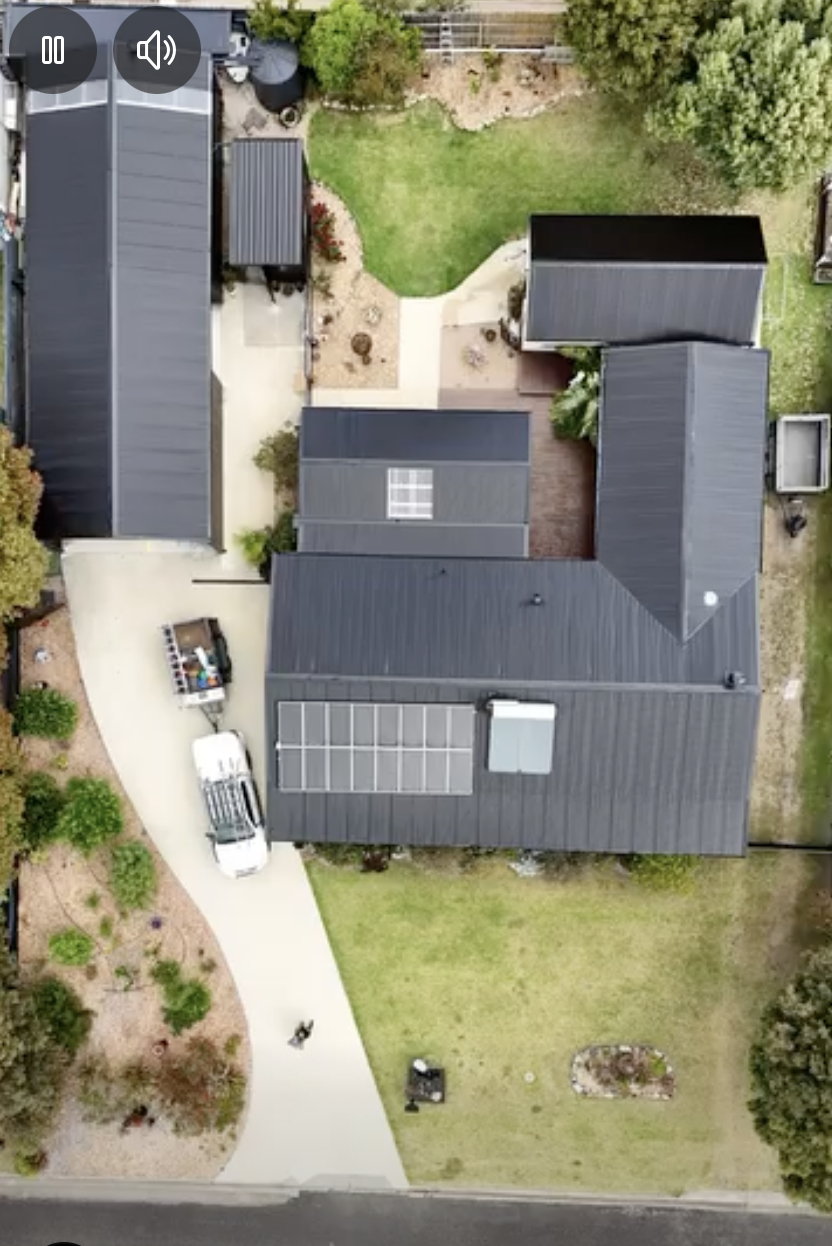 Riviera Roofing A property with two main structures, taken from a drone shot, with the roof restored by Riviera Roofing, East Gippsland